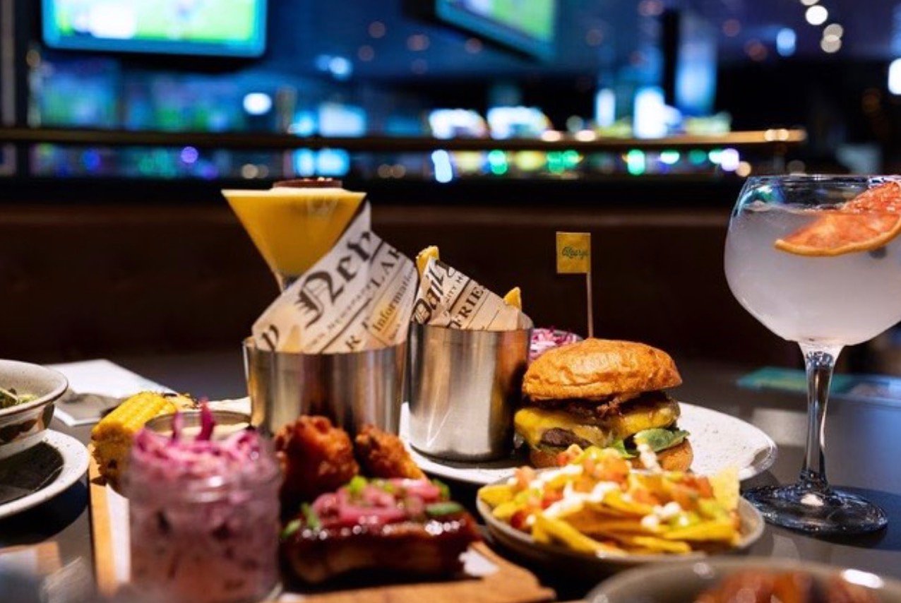 Burgers, fries, and cocktails served at O'Learys sports bar in Vilnius.