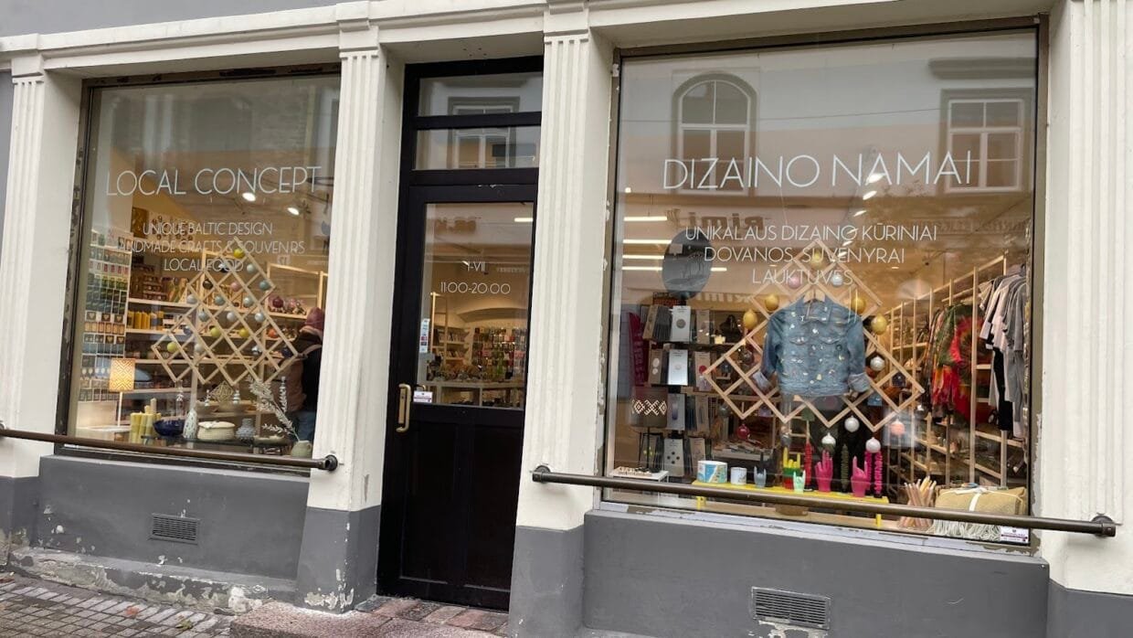 Colorful boutique street with local design shops, vintage stores, and creative concept spaces for shopping in Vilnius.