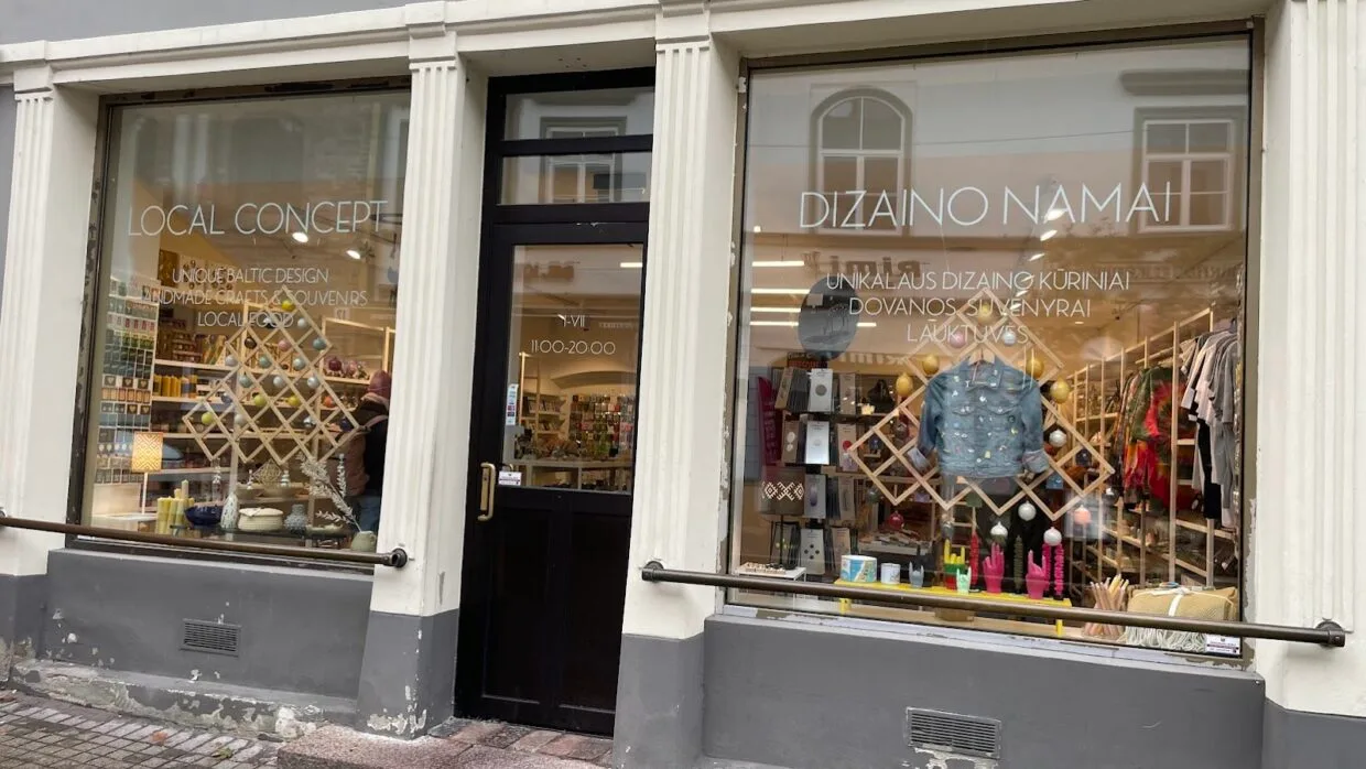 Colorful boutique street with local design shops, vintage stores, and creative concept spaces for shopping in Vilnius.