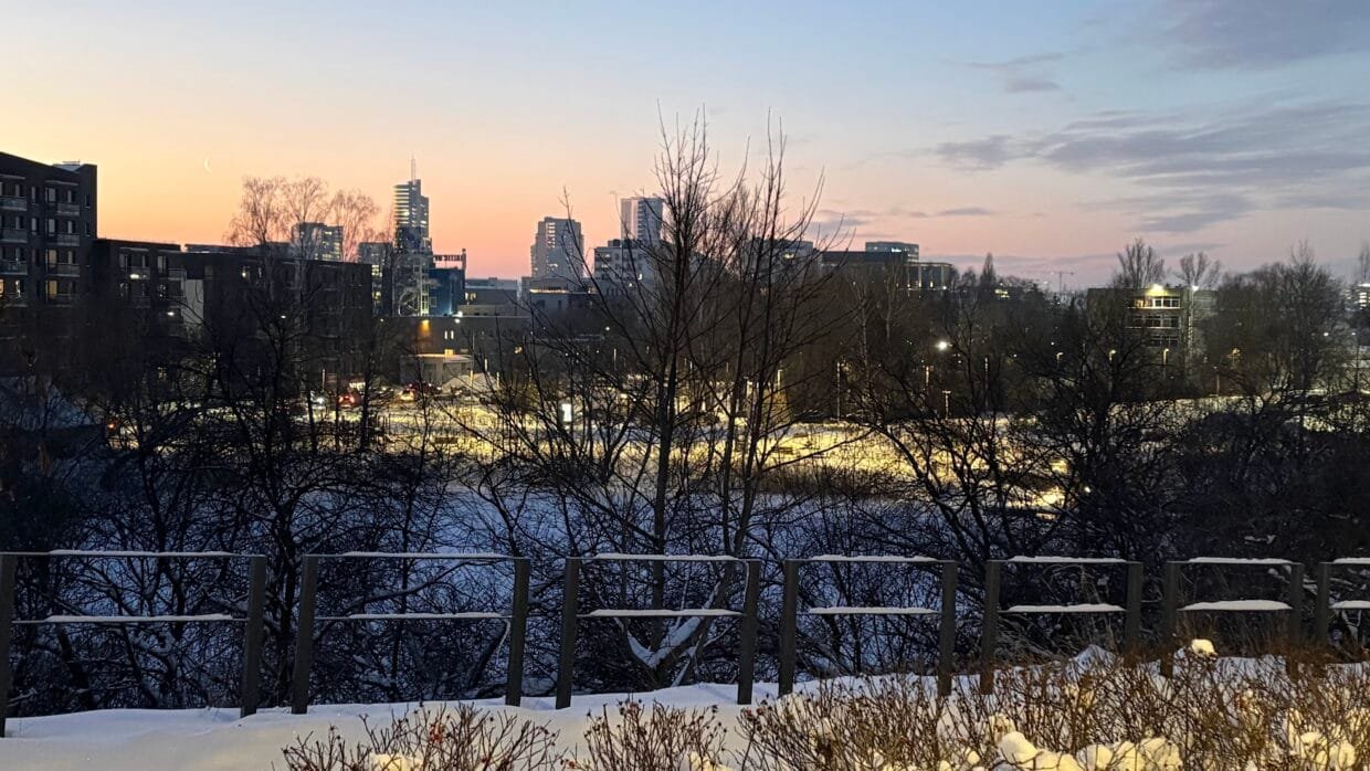 A sunny panoramic view of the Old Town, showcasing one of the most scenic free things to do in Vilnius for locals.
