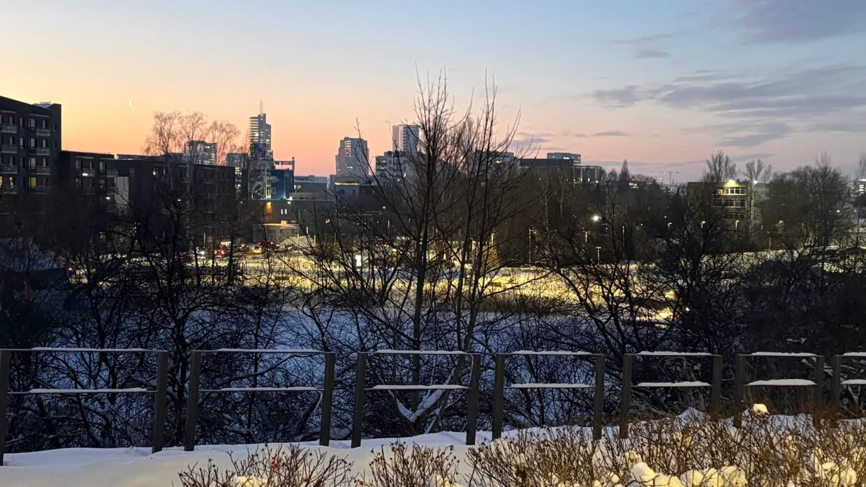 A sunny panoramic view of the Old Town, showcasing one of the most scenic free things to do in Vilnius for locals.