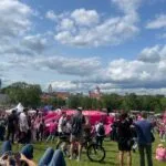 Crowd gathered outdoors, showcasing traditional festivals in Lithuania.