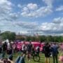 Crowd gathered outdoors, showcasing traditional festivals in Lithuania.
