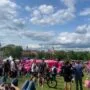 Crowd gathered outdoors, showcasing traditional festivals in Lithuania.